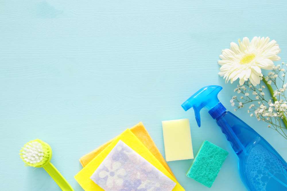 Spring,Cleaning,Concept,With,Supplies,On,Wooden,Table