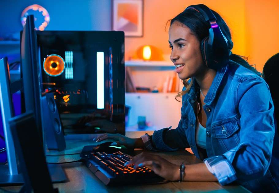 Blog-hero_How-Scammers-Target-Kids-Online_Teen-Girl-playing-video-games_1200x630_Facebook