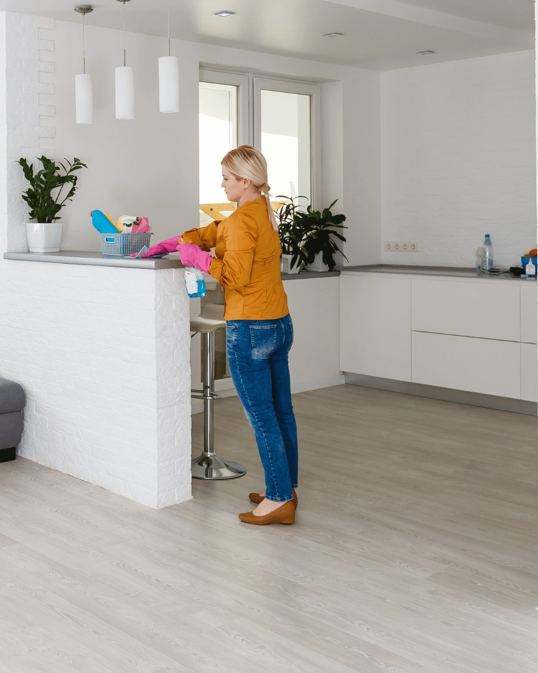 Woman scrubbing the bathroom.